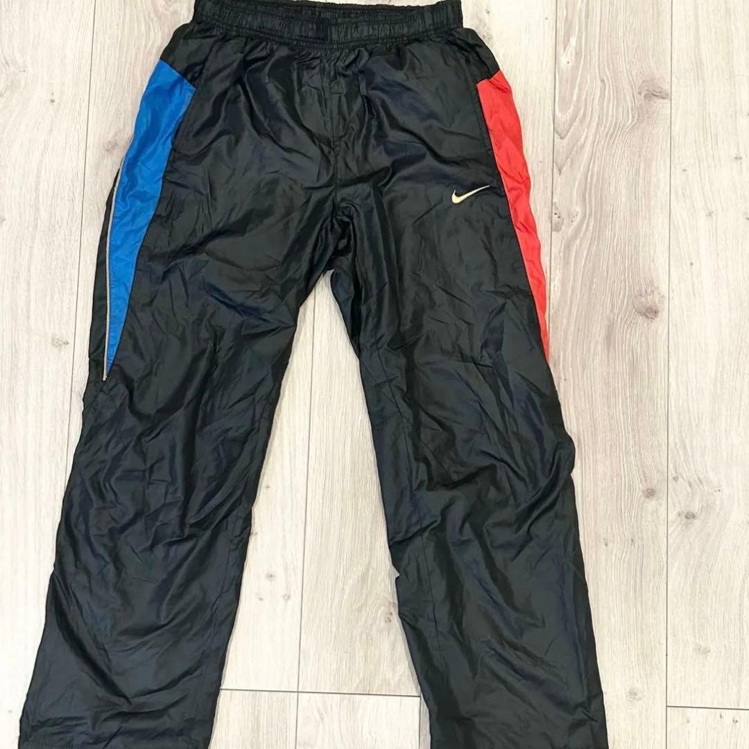 希少デザイン・美品　NIKE ナイロンパンツ トラックパンツ マルチカラー　L